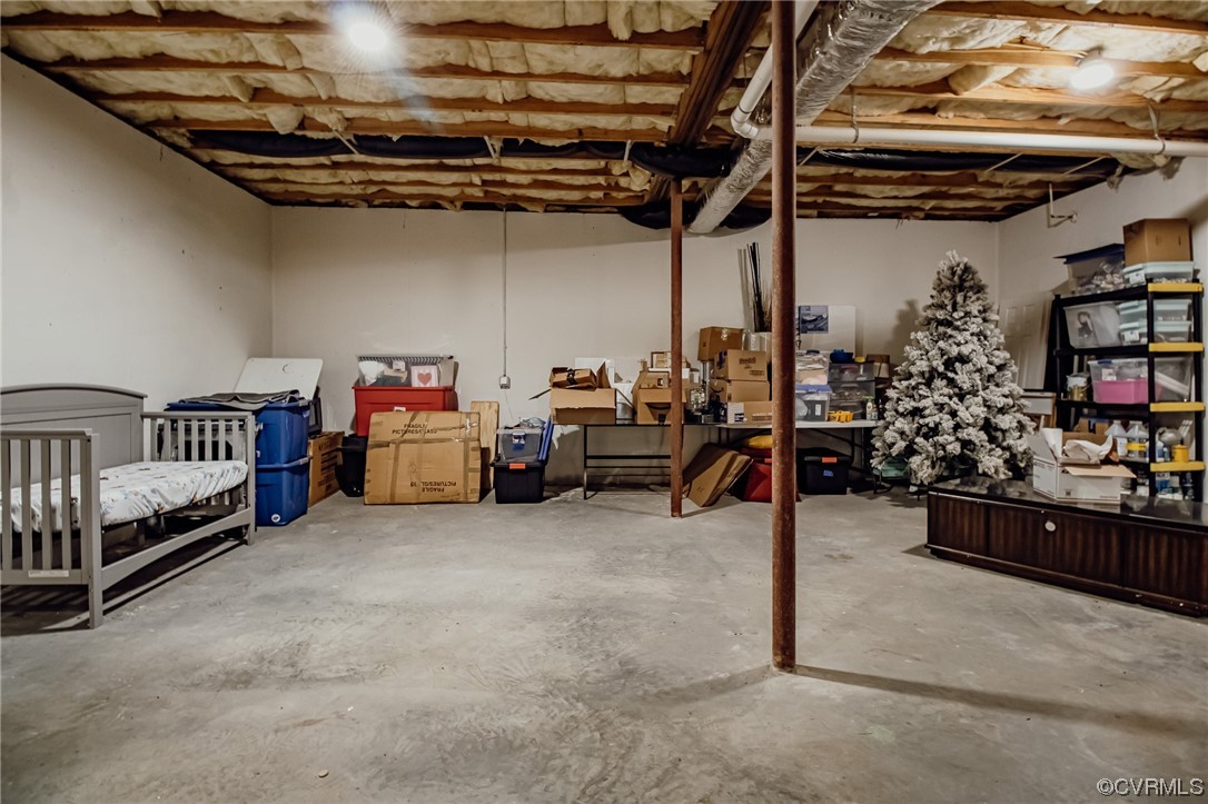 3105 Blue Bell Farms Road Powhatan, VA 23139 - Photo 41 of 50 a view of a garage with storage