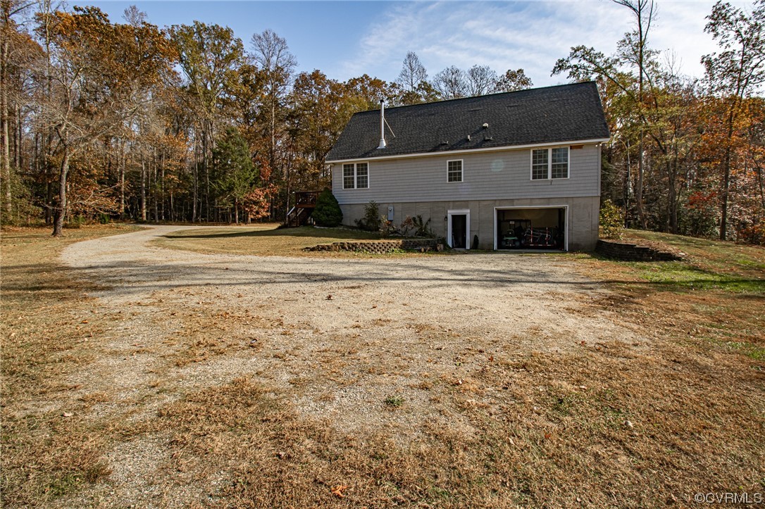 3105 Blue Bell Farms Road Powhatan, VA 23139 - Photo 44 of 50 a view of a house with a yard