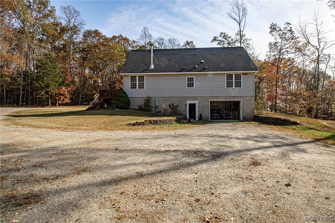 3105 Blue Bell Farms Road Powhatan, VA 23139 - Photo 45 of 50 a front view of a house with a yard