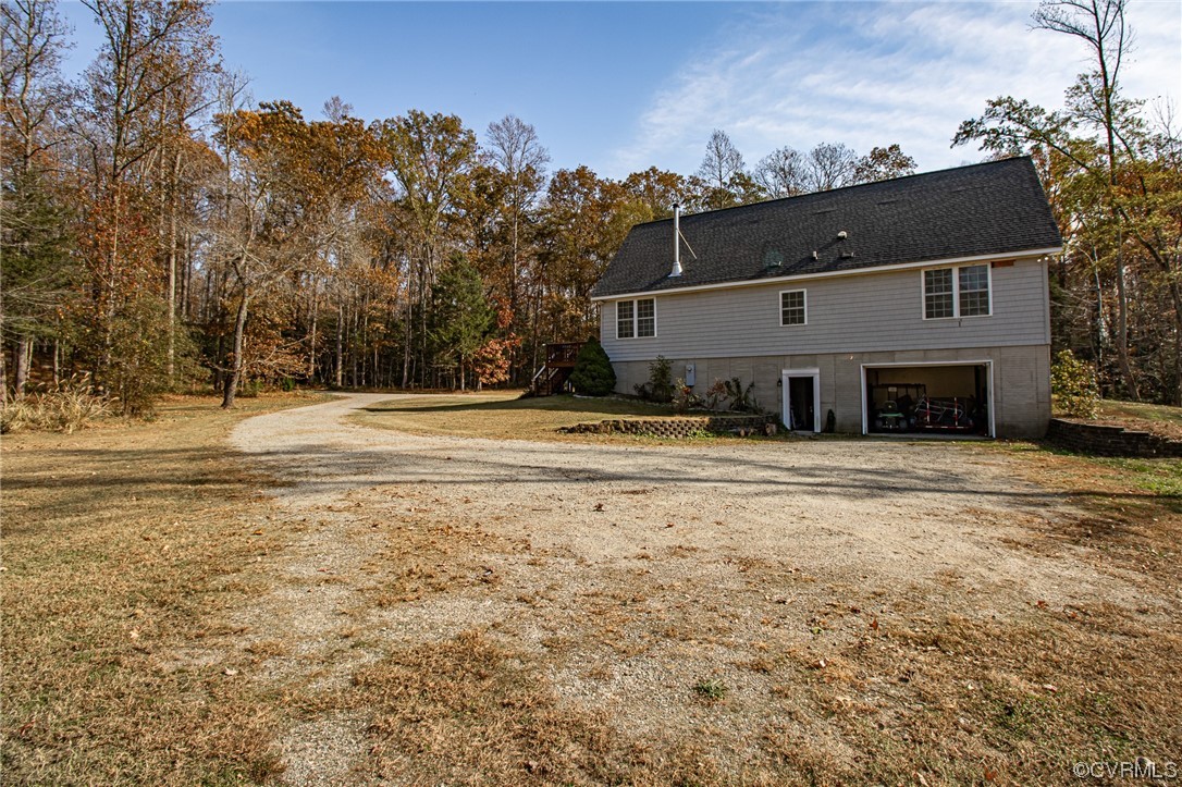 3105 Blue Bell Farms Road Powhatan, VA 23139 - Photo 46 of 50 a view of a house with a yard