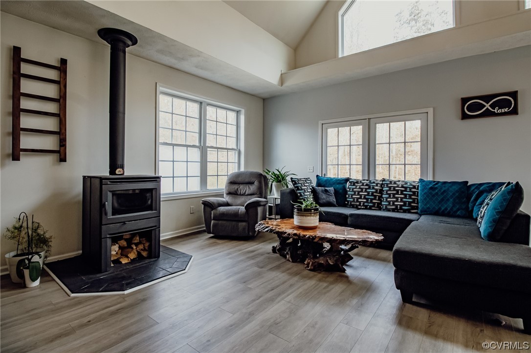 3105 Blue Bell Farms Road Powhatan, VA 23139 - Photo 8 of 50 a living room with furniture and a flat screen tv with wooden floor