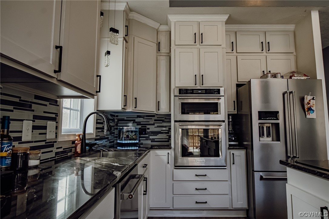 3105 Blue Bell Farms Road Powhatan, VA 23139 - Photo 10 of 50 a kitchen with stainless steel appliances a refrigerator stove and sink