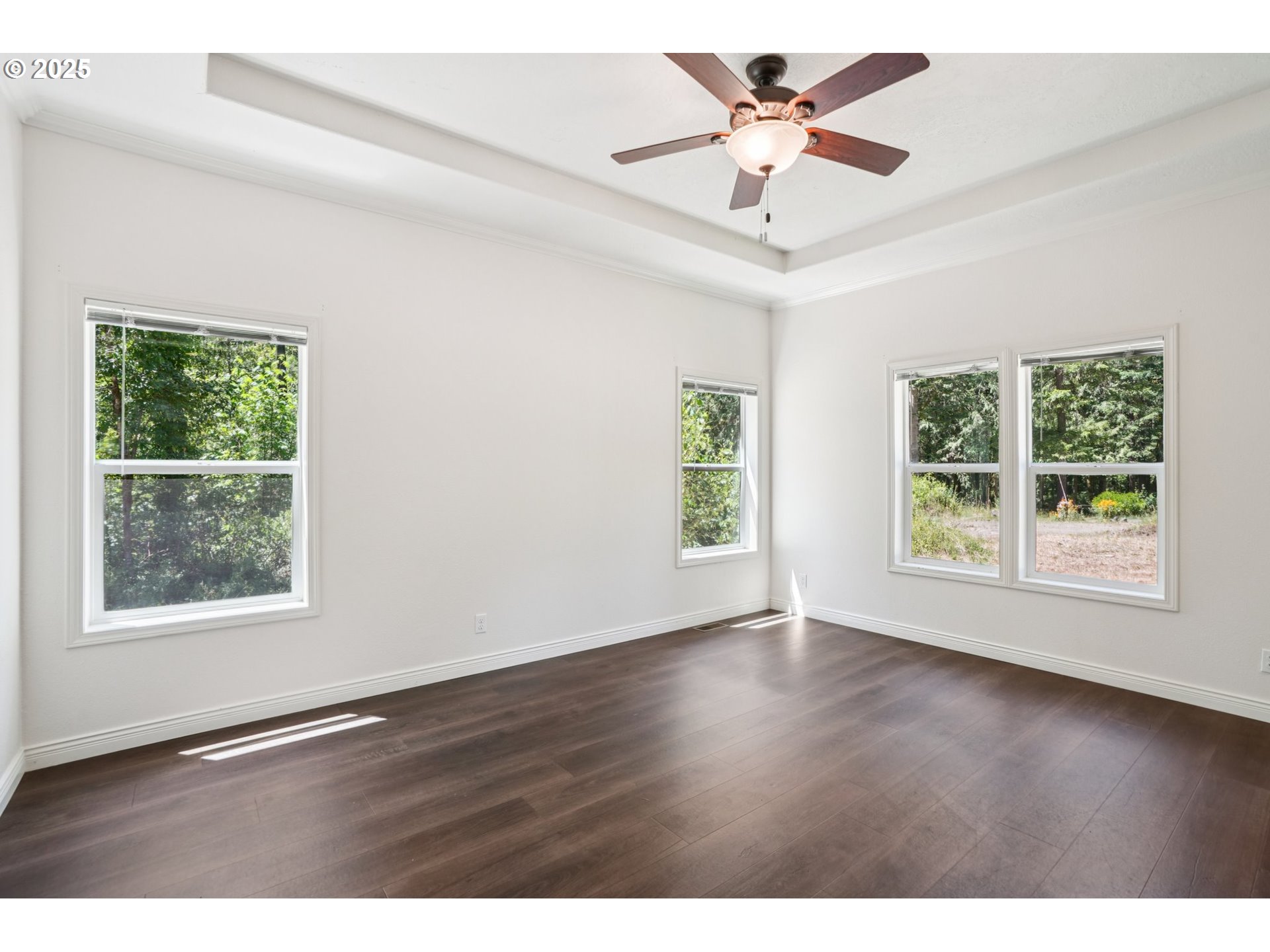 64314 East Barlow Trail Road Rhododendron, OR 97049 - Photo 12 of 30 a view of an empty room with wooden floor and a window