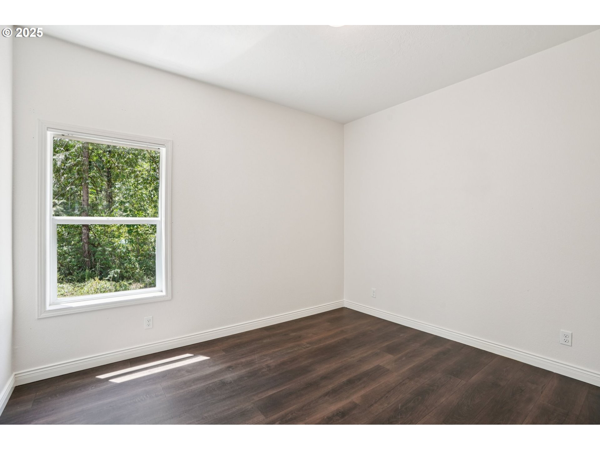 64314 East Barlow Trail Road Rhododendron, OR 97049 - Photo 15 of 30 an empty room with wooden floor and windows