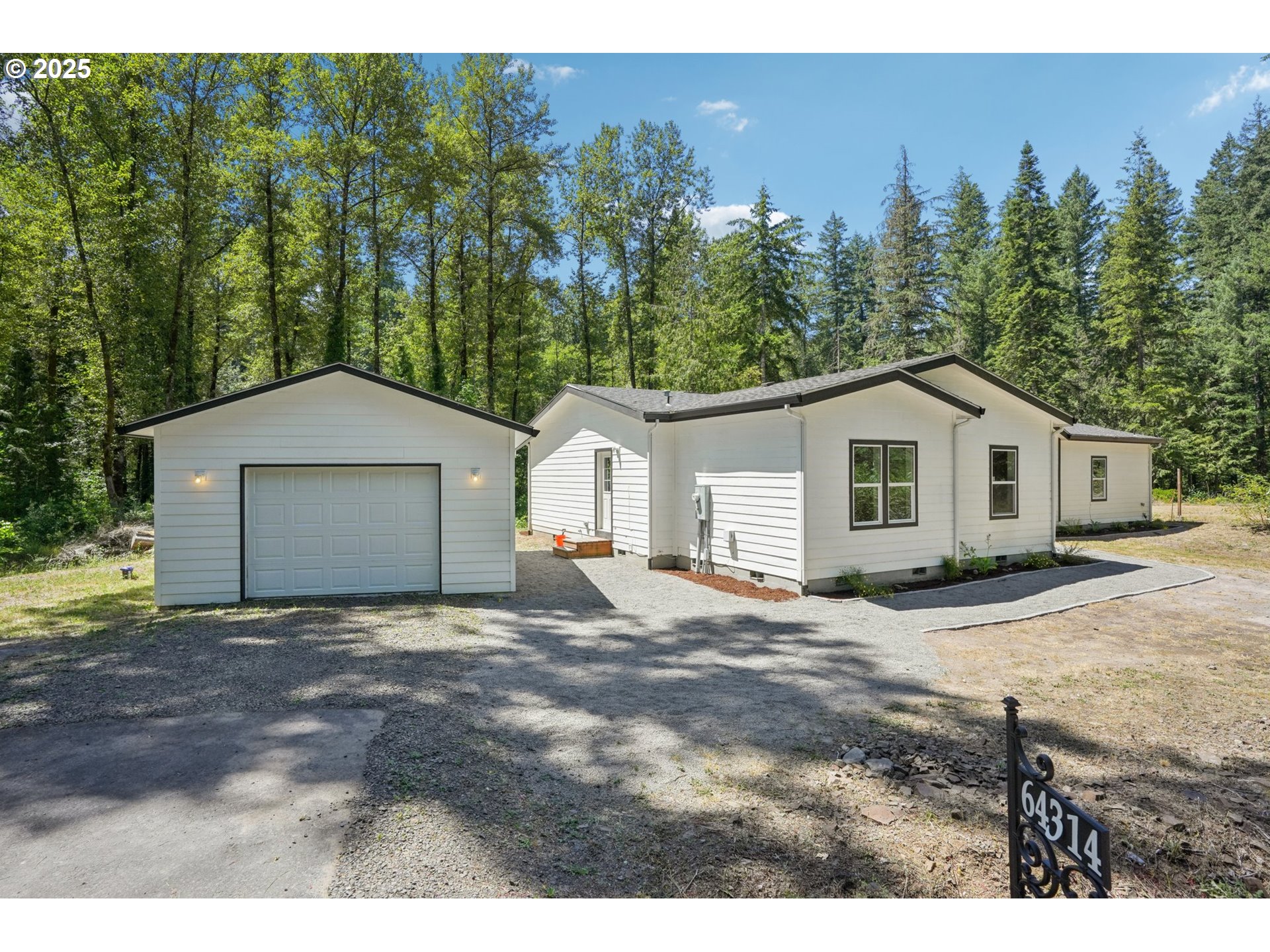 64314 East Barlow Trail Road Rhododendron, OR 97049 - Photo 29 of 30 a view of a house with a yard