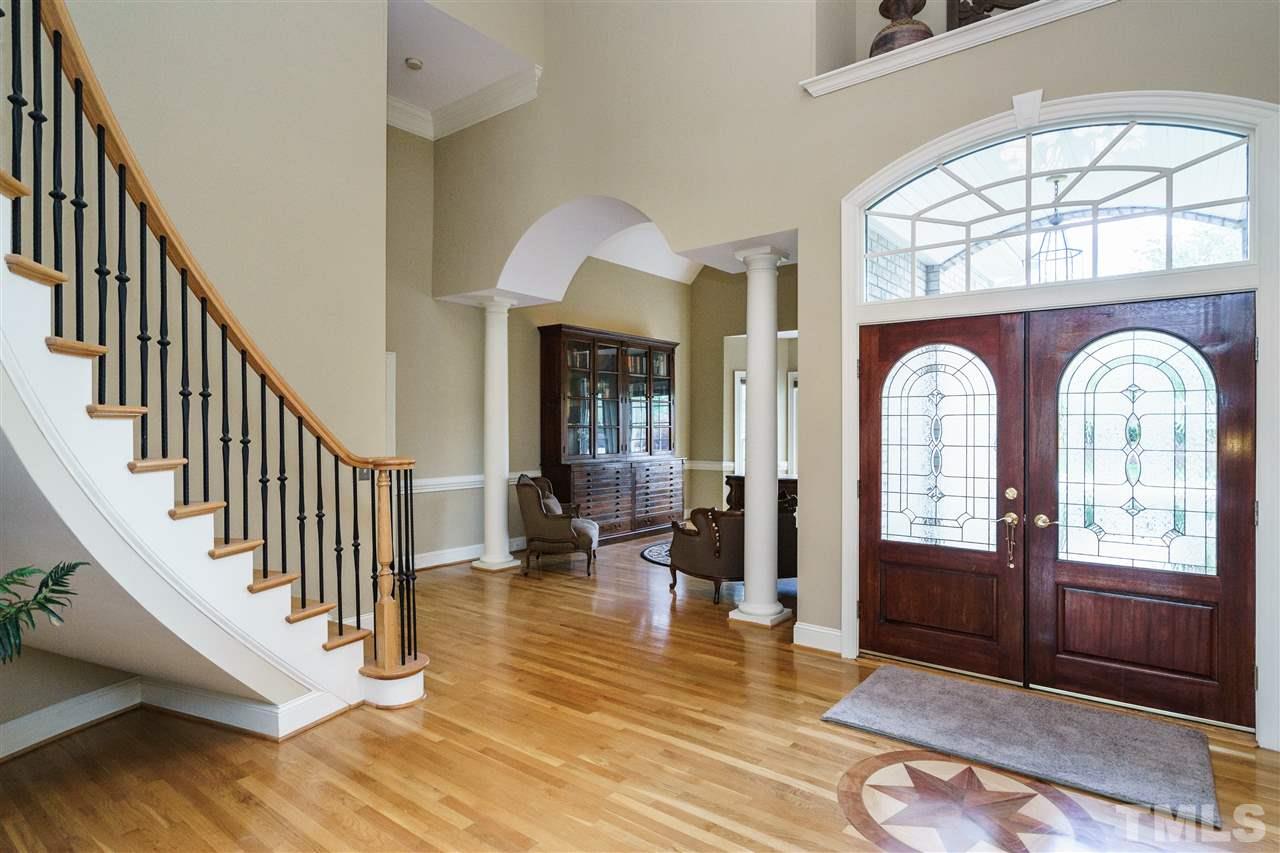 12432 Bayleaf Church Road Raleigh, NC 27614 - Photo 2 of 25 a view of entryway and hall with wooden floor