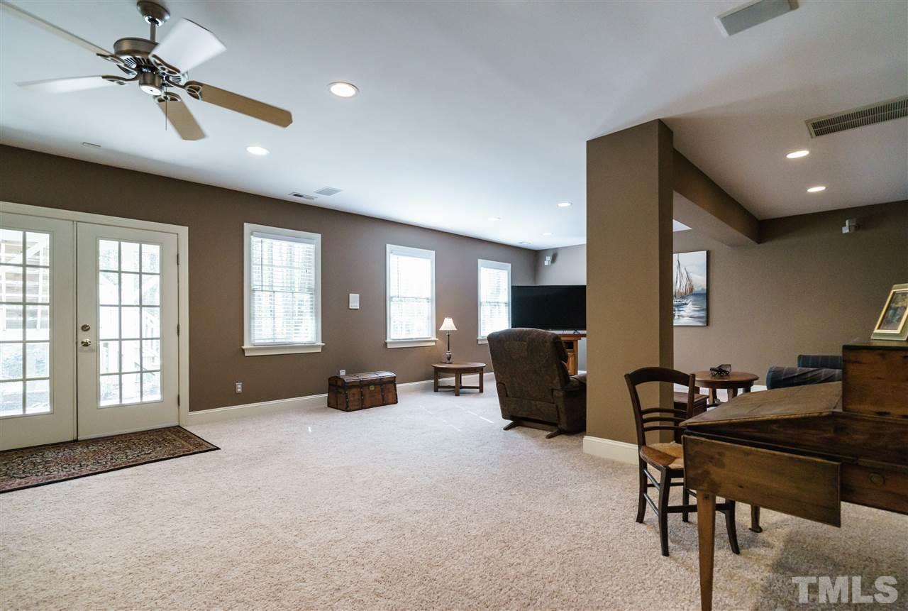 12432 Bayleaf Church Road Raleigh, NC 27614 - Photo 18 of 25 a view of a livingroom with furniture and a window