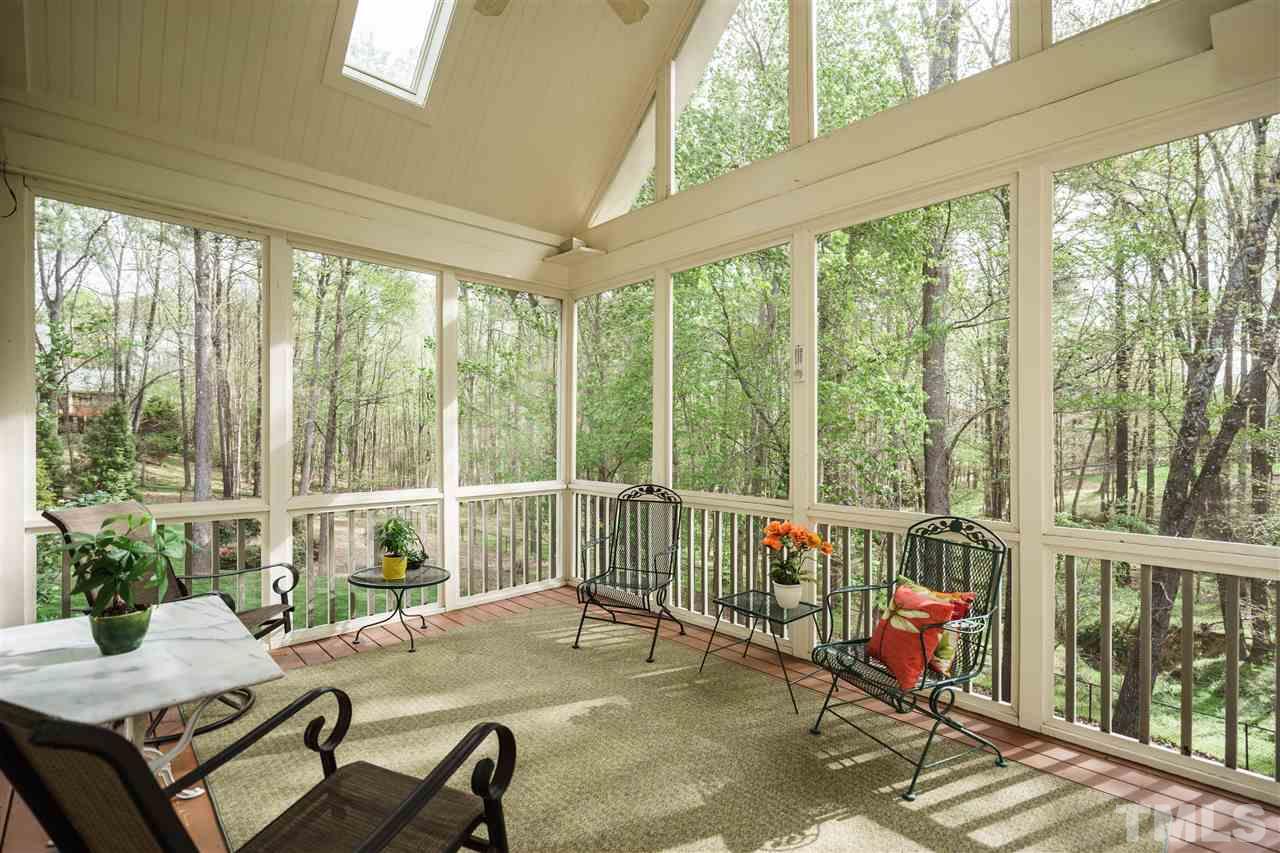12432 Bayleaf Church Road Raleigh, NC 27614 - Photo 20 of 25 a living room with furniture and a large window