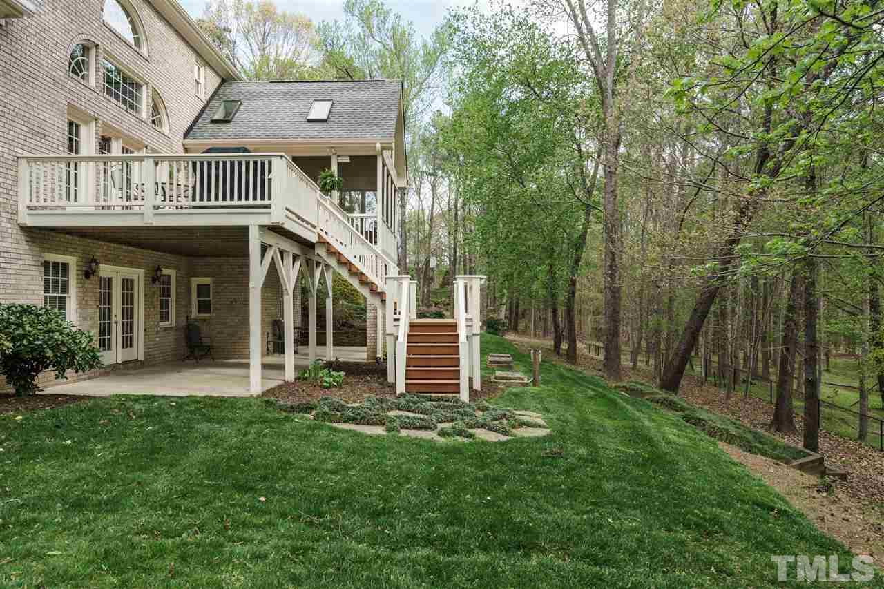 12432 Bayleaf Church Road Raleigh, NC 27614 - Photo 23 of 25 a front view of a house with a garden