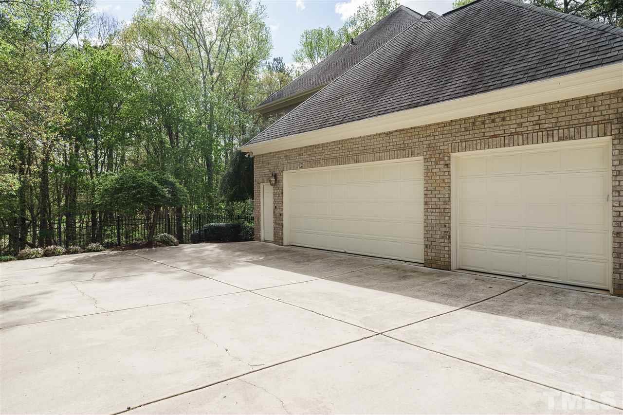 12432 Bayleaf Church Road Raleigh, NC 27614 - Photo 24 of 25 a view of backyard and garage