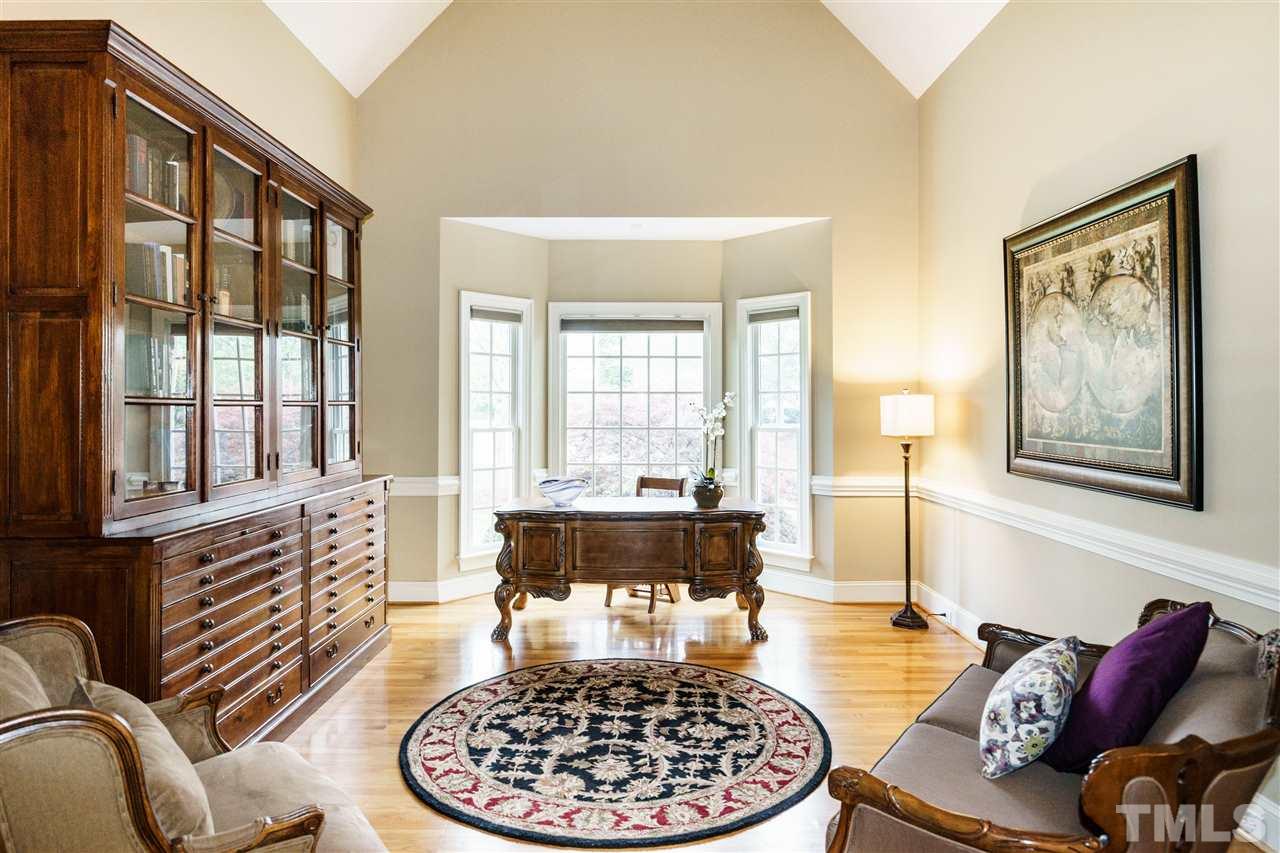 12432 Bayleaf Church Road Raleigh, NC 27614 - Photo 4 of 25 a living room with furniture and a large window