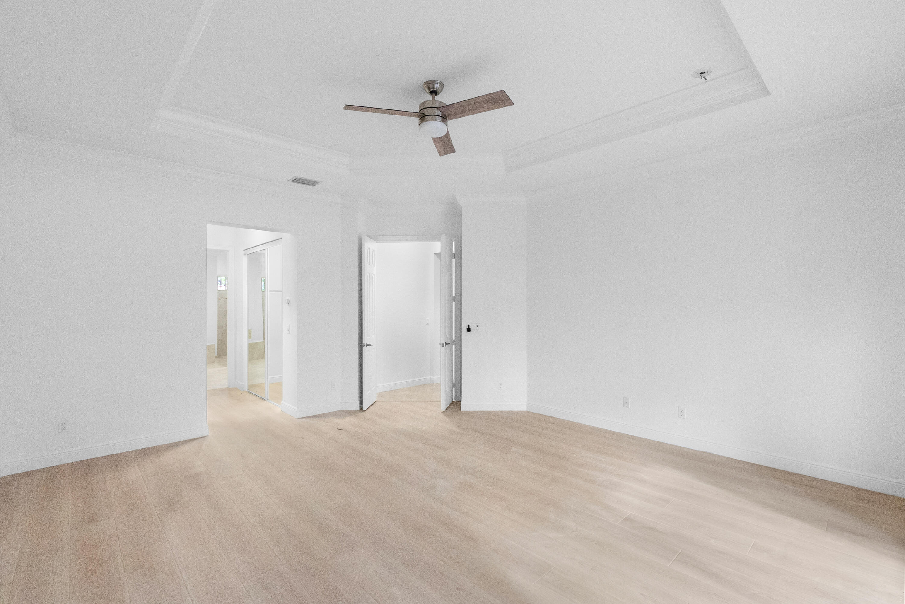 301 Rudder Cay Way Jupiter, FL 33458 - Photo 14 of 59 a view of a room with a ceiling fan
