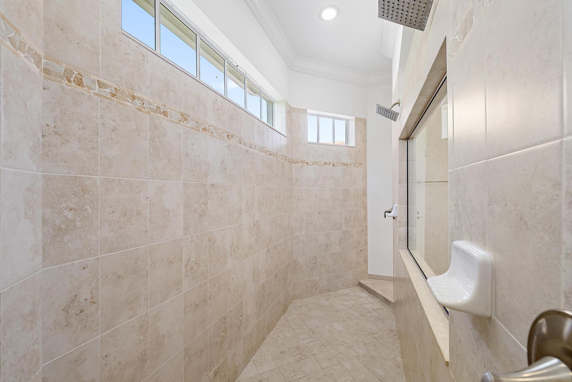 301 Rudder Cay Way Jupiter, FL 33458 - Photo 21 of 59 a bathroom with a toilet and a shower