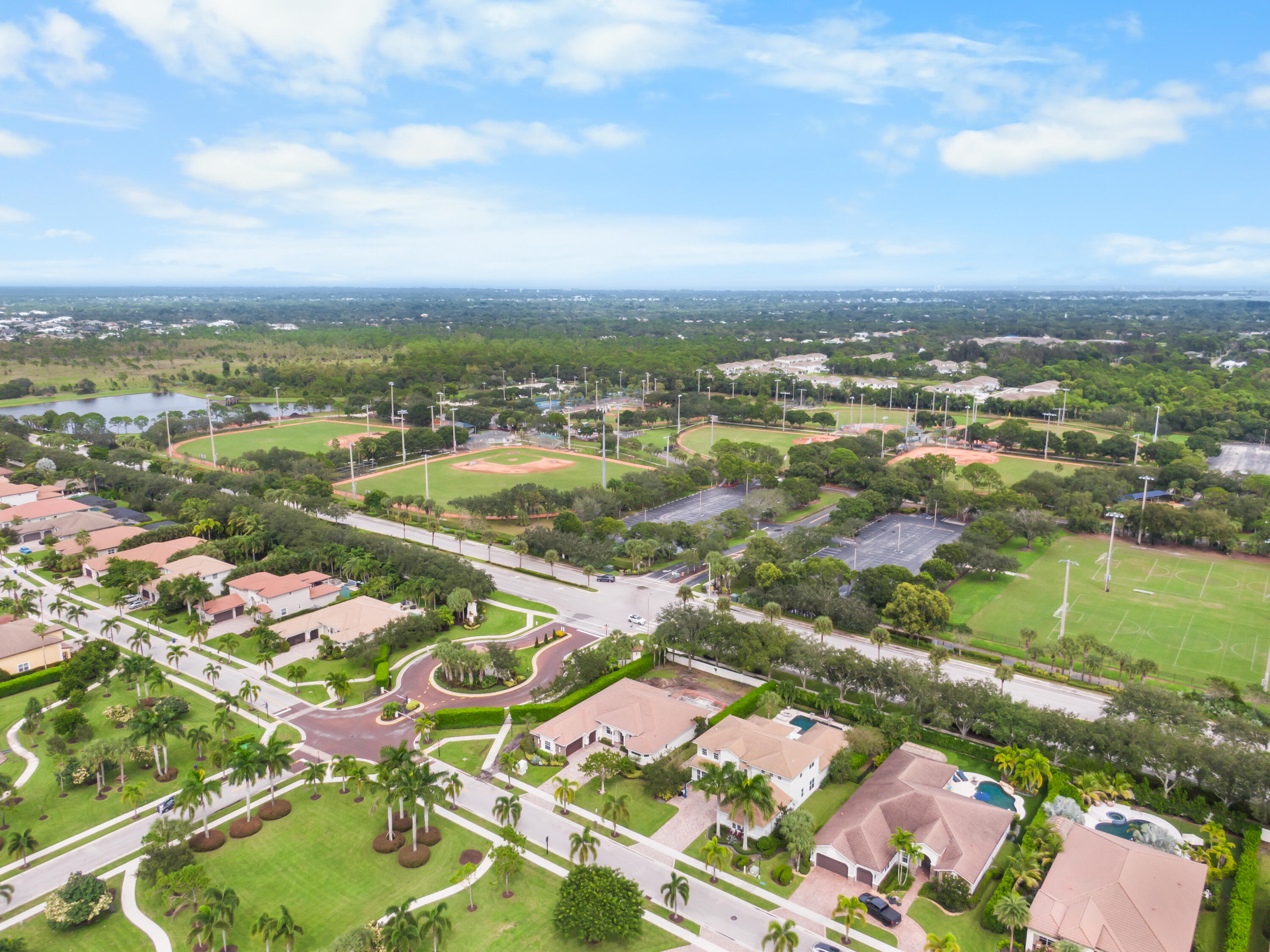 301 Rudder Cay Way Jupiter, FL 33458 - Photo 35 of 59 an aerial view of residential houses with outdoor space