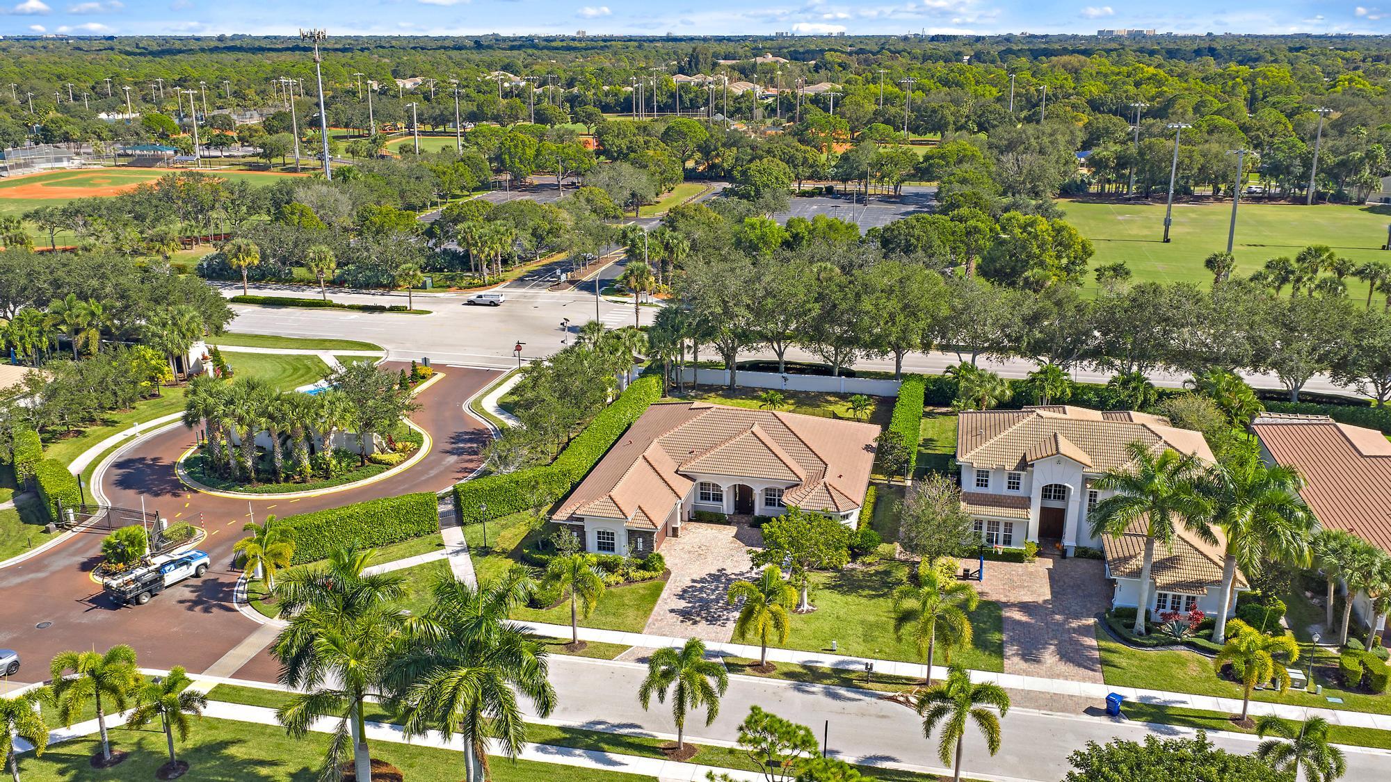 301 Rudder Cay Way Jupiter, FL 33458 - Photo 46 of 59 an aerial view of residential houses with outdoor space and swimming pool