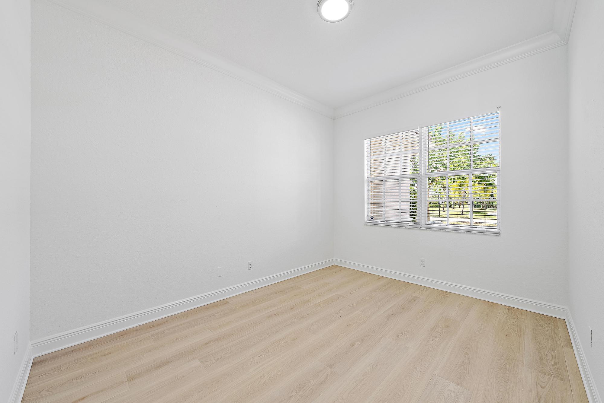 301 Rudder Cay Way Jupiter, FL 33458 - Photo 53 of 59 an empty room with windows