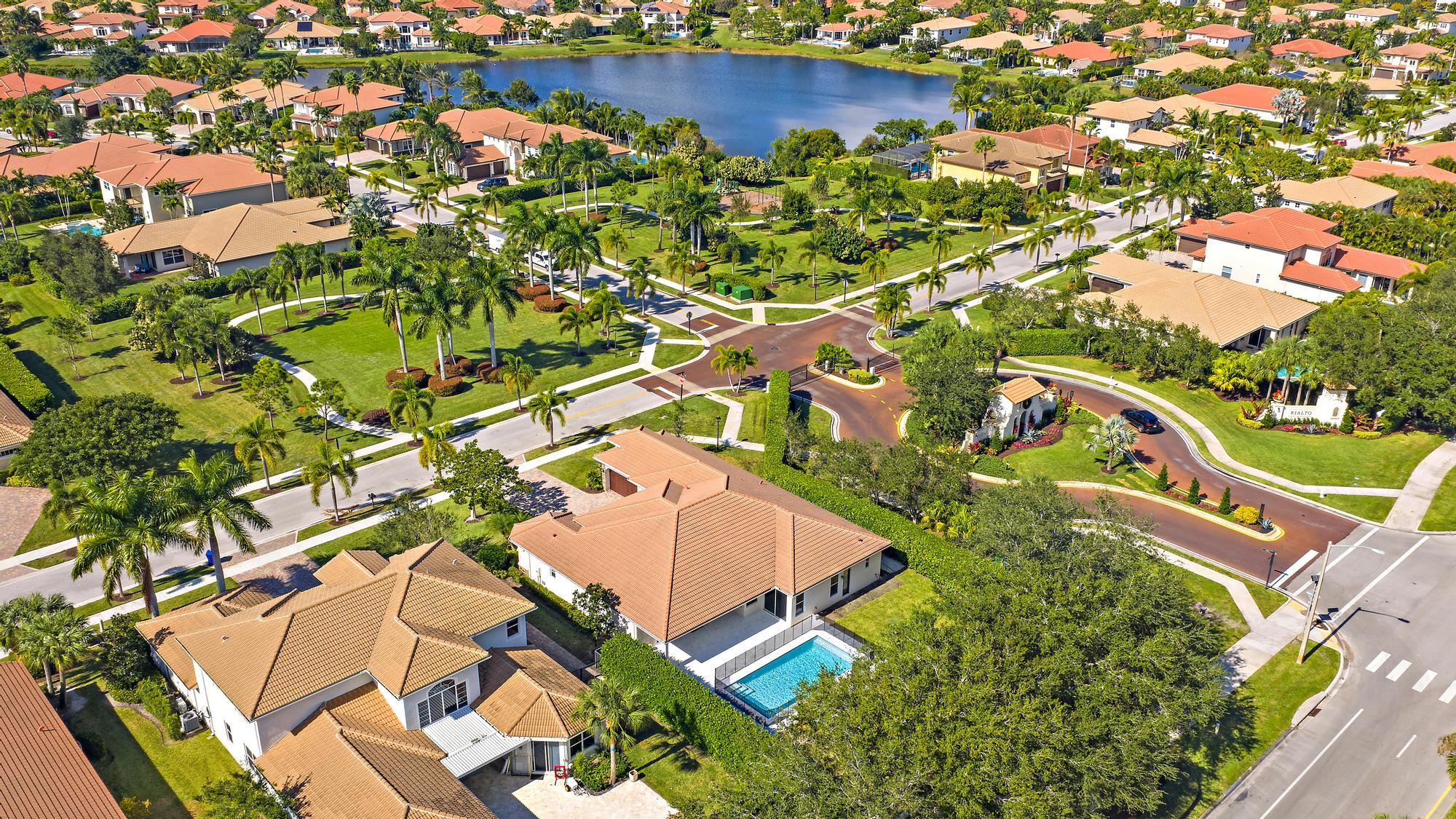 301 Rudder Cay Way Jupiter, FL 33458 - Photo 56 of 59 an aerial view of residential house with outdoor space and a lake view