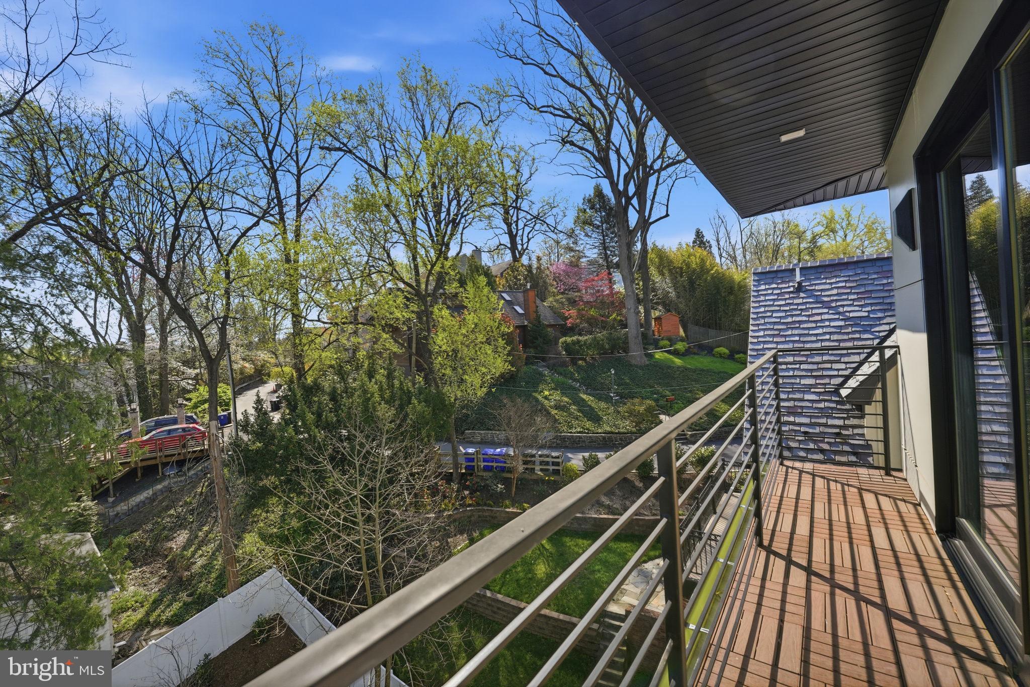 2211 Military Road Arlington, VA 22207 - Photo 72 of 107 Serene balcony with lush green views.