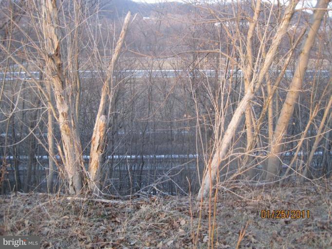 6259 Pious Ridge Road Berkeley Springs, WV 25411 - Photo 22 of 30 railroad below/ airstrip or railroad parking?