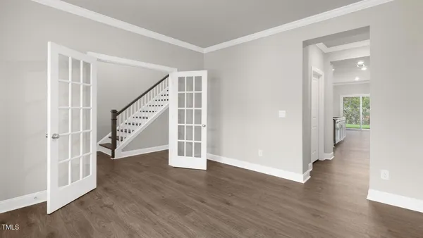 a view of entryway with wooden floor