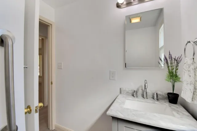 a view of a house with a yard and garage