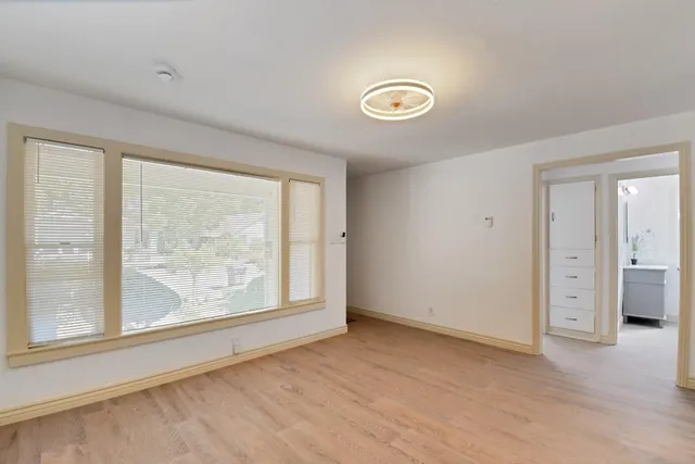 an empty room with windows