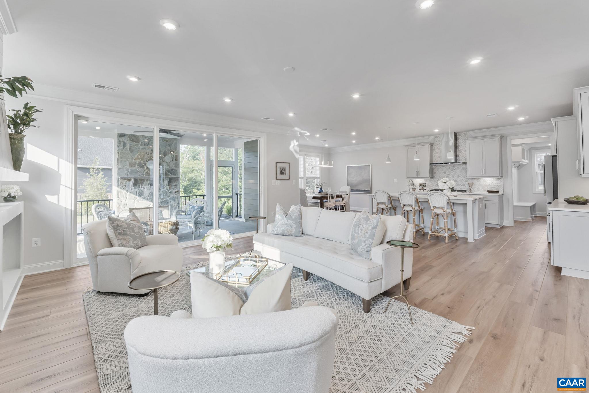 1805 Fowler Street Charlottesville, VA 22901 - Photo 11 of 60 a living room with lots of furniture and view of kitchen