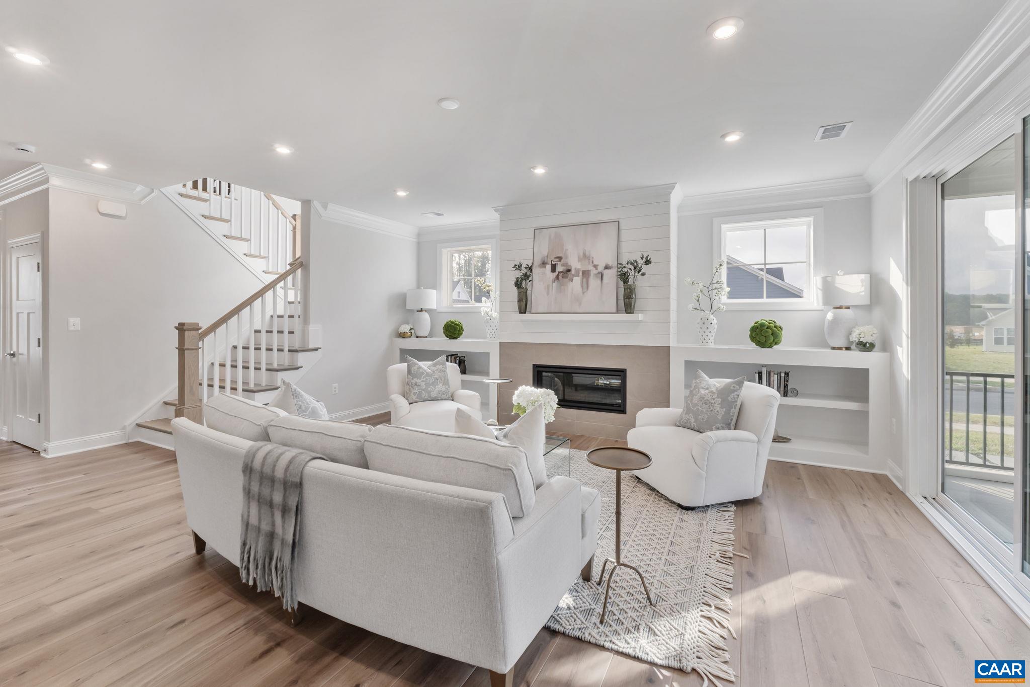 1805 Fowler Street Charlottesville, VA 22901 - Photo 13 of 60 a living room with fireplace furniture and a wooden floor