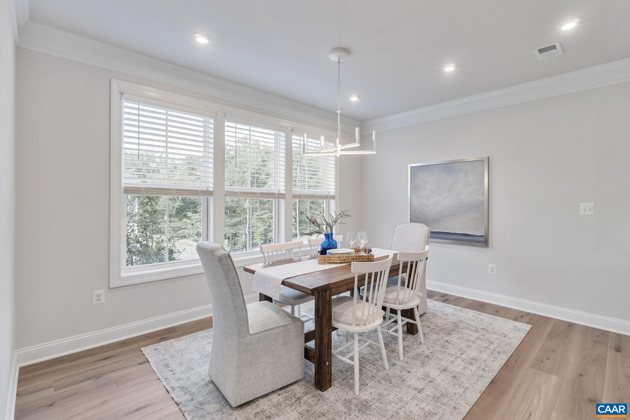 1805 Fowler Street Charlottesville, VA 22901 - Photo 22 of 60 a view of a dining room with furniture window and wooden floor