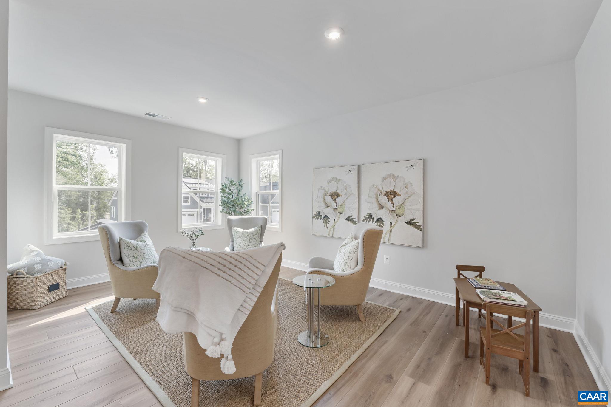 1805 Fowler Street Charlottesville, VA 22901 - Photo 29 of 60 a living room with furniture and a large window