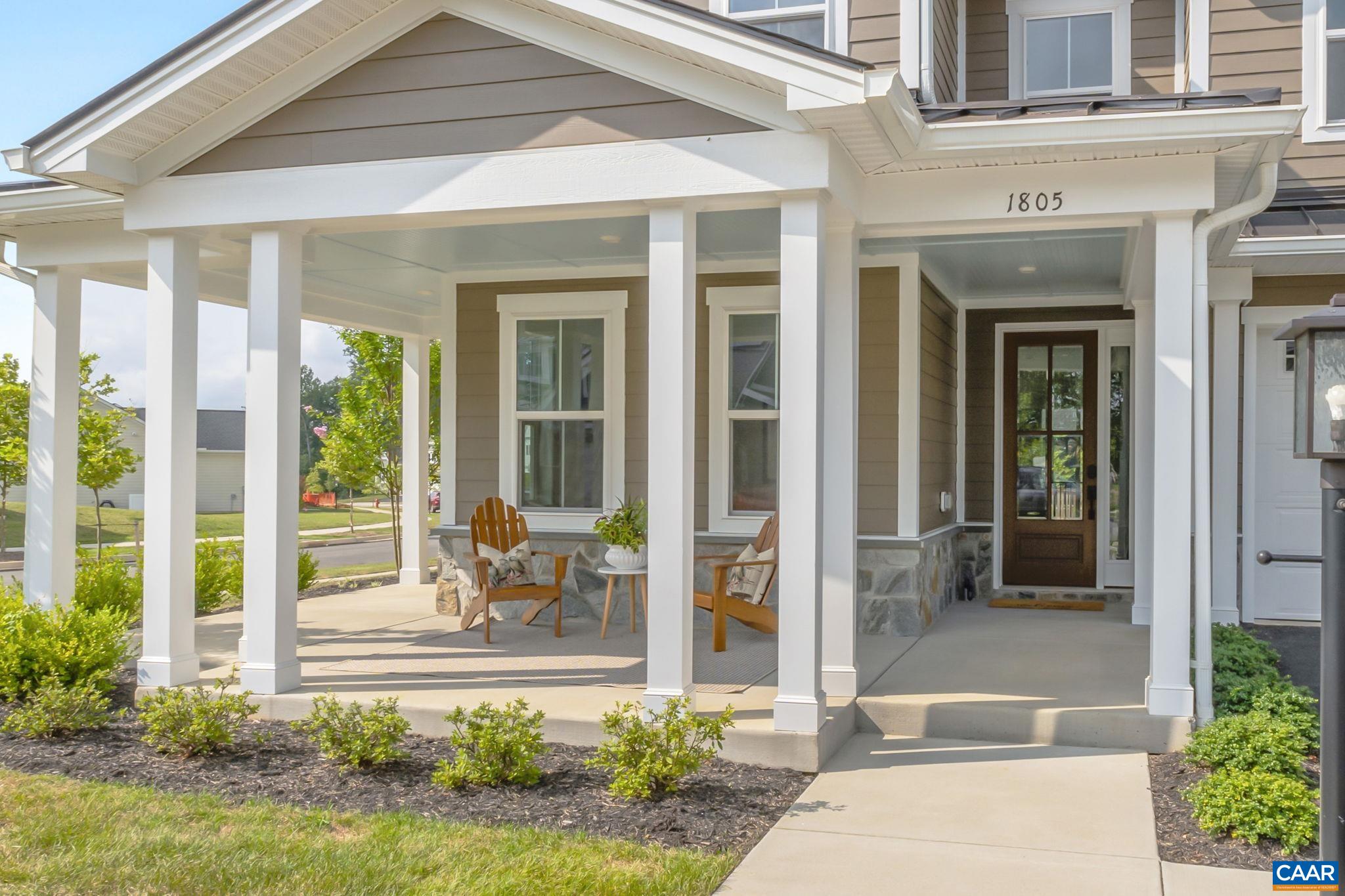 1805 Fowler Street Charlottesville, VA 22901 - Photo 3 of 60 a front view of a house with a yard outdoor seating and garage
