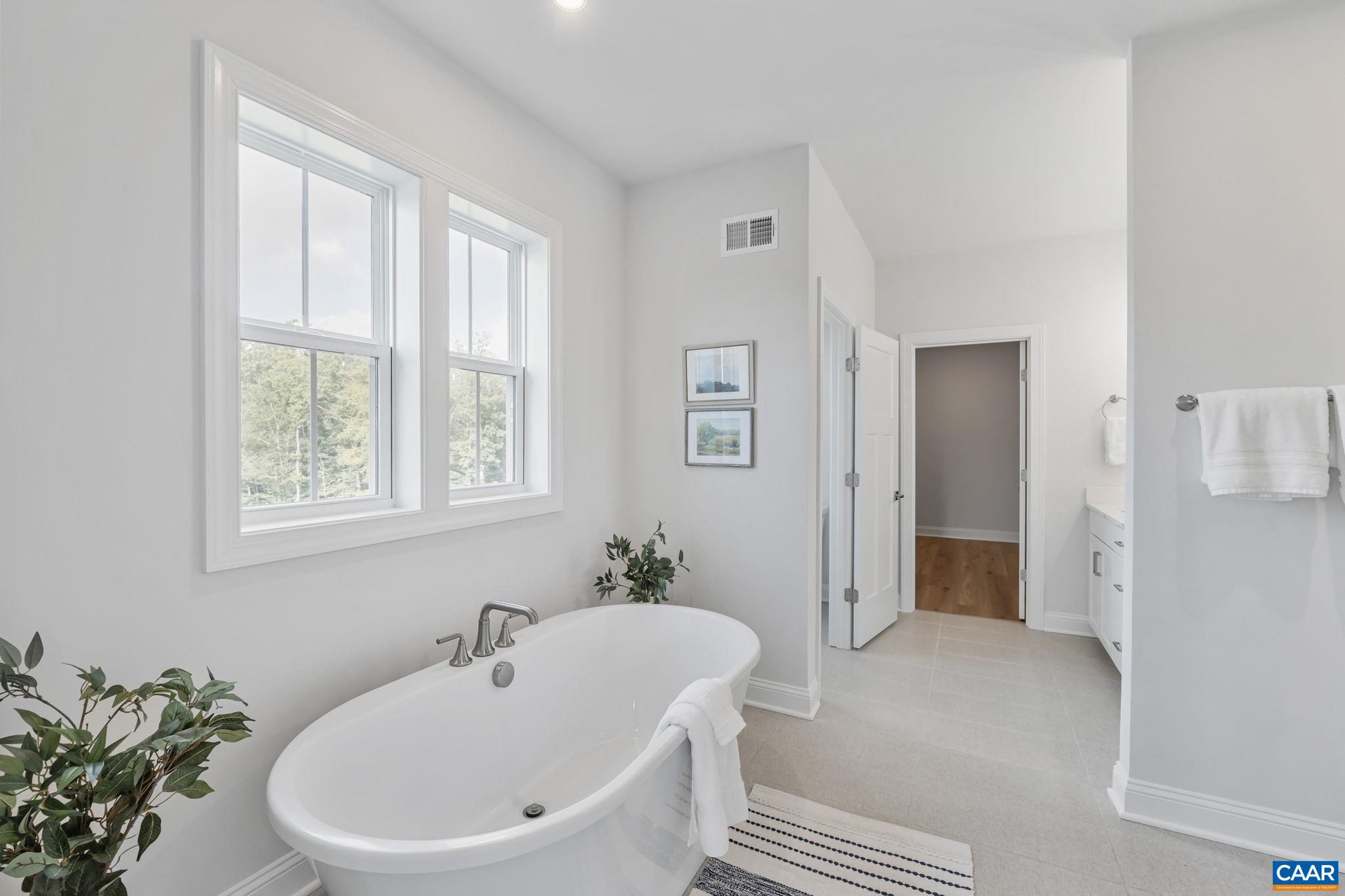 1805 Fowler Street Charlottesville, VA 22901 - Photo 35 of 60 a white bath tub sitting next to a white sink