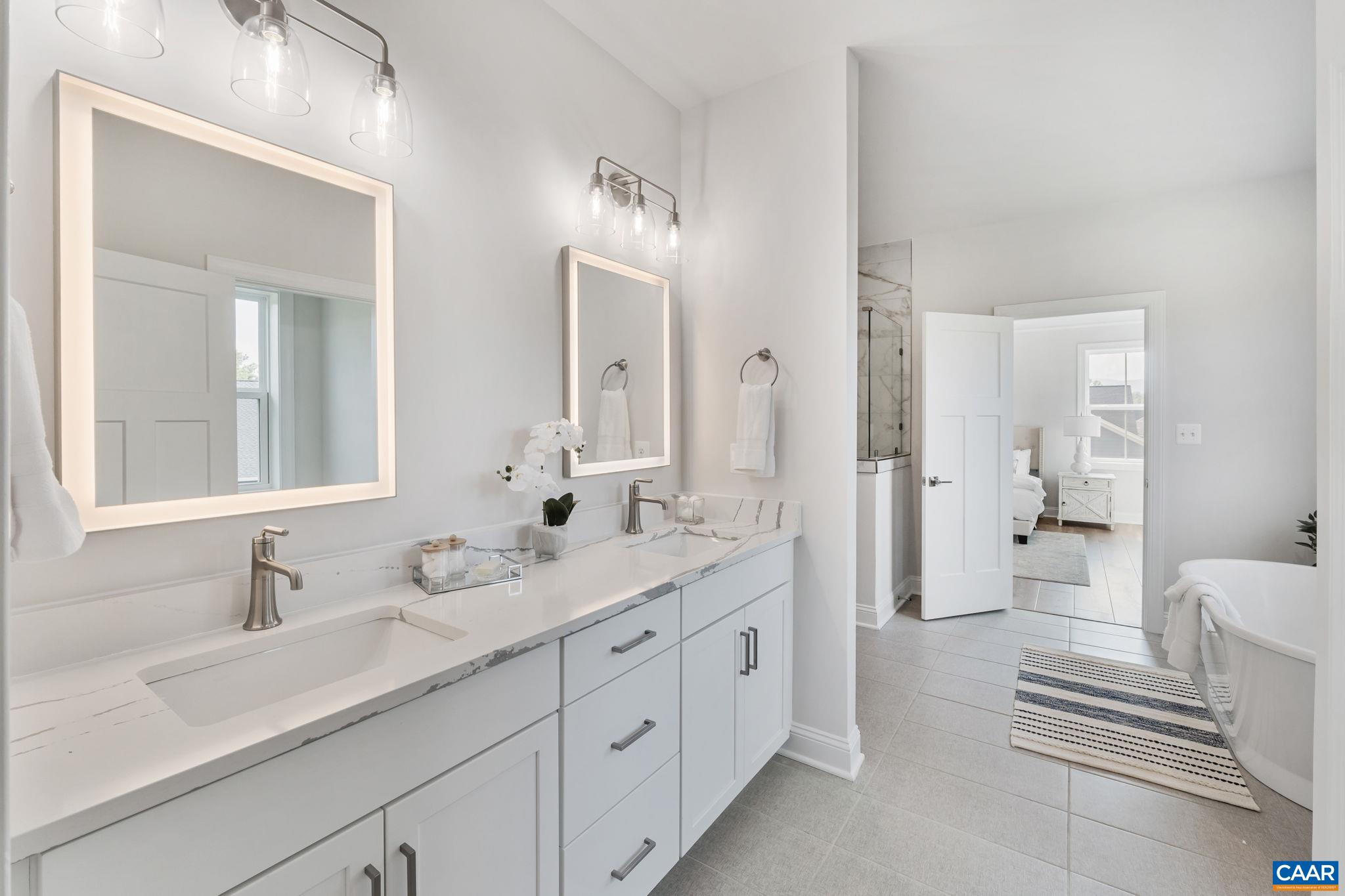 1805 Fowler Street Charlottesville, VA 22901 - Photo 38 of 60 a spacious bathroom with double sink and a mirror