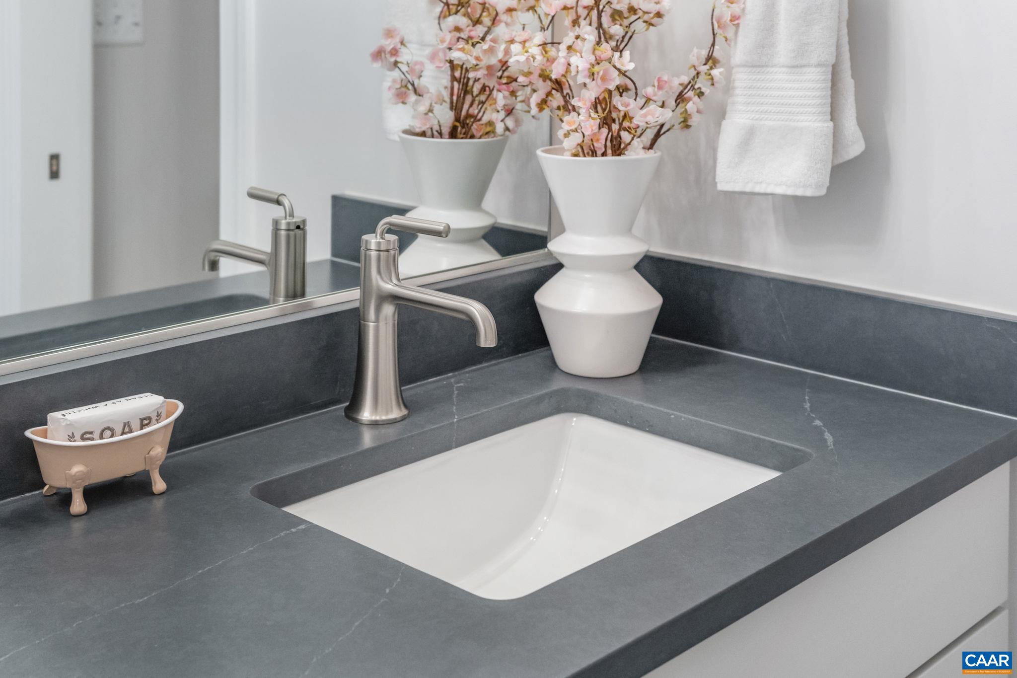 1805 Fowler Street Charlottesville, VA 22901 - Photo 47 of 60 a living room with furniture and a table