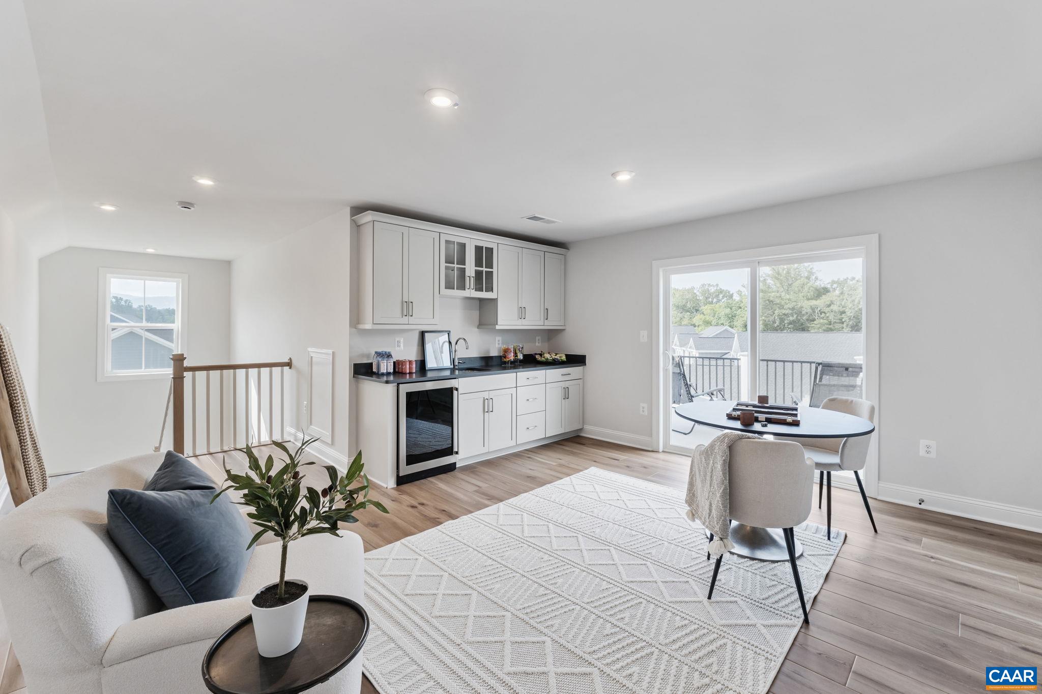 1805 Fowler Street Charlottesville, VA 22901 - Photo 51 of 60 a living room with furniture and a large window