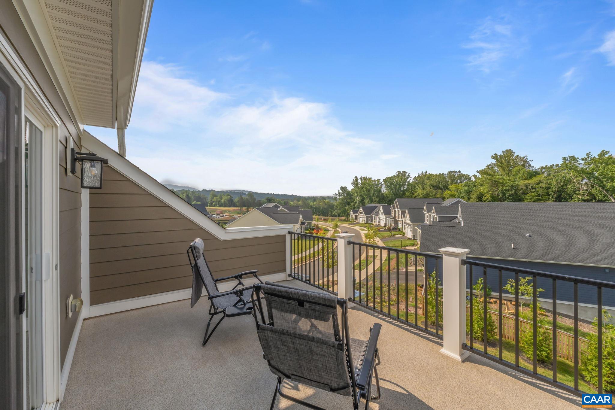 1805 Fowler Street Charlottesville, VA 22901 - Photo 52 of 60 a view of a balcony with chairs