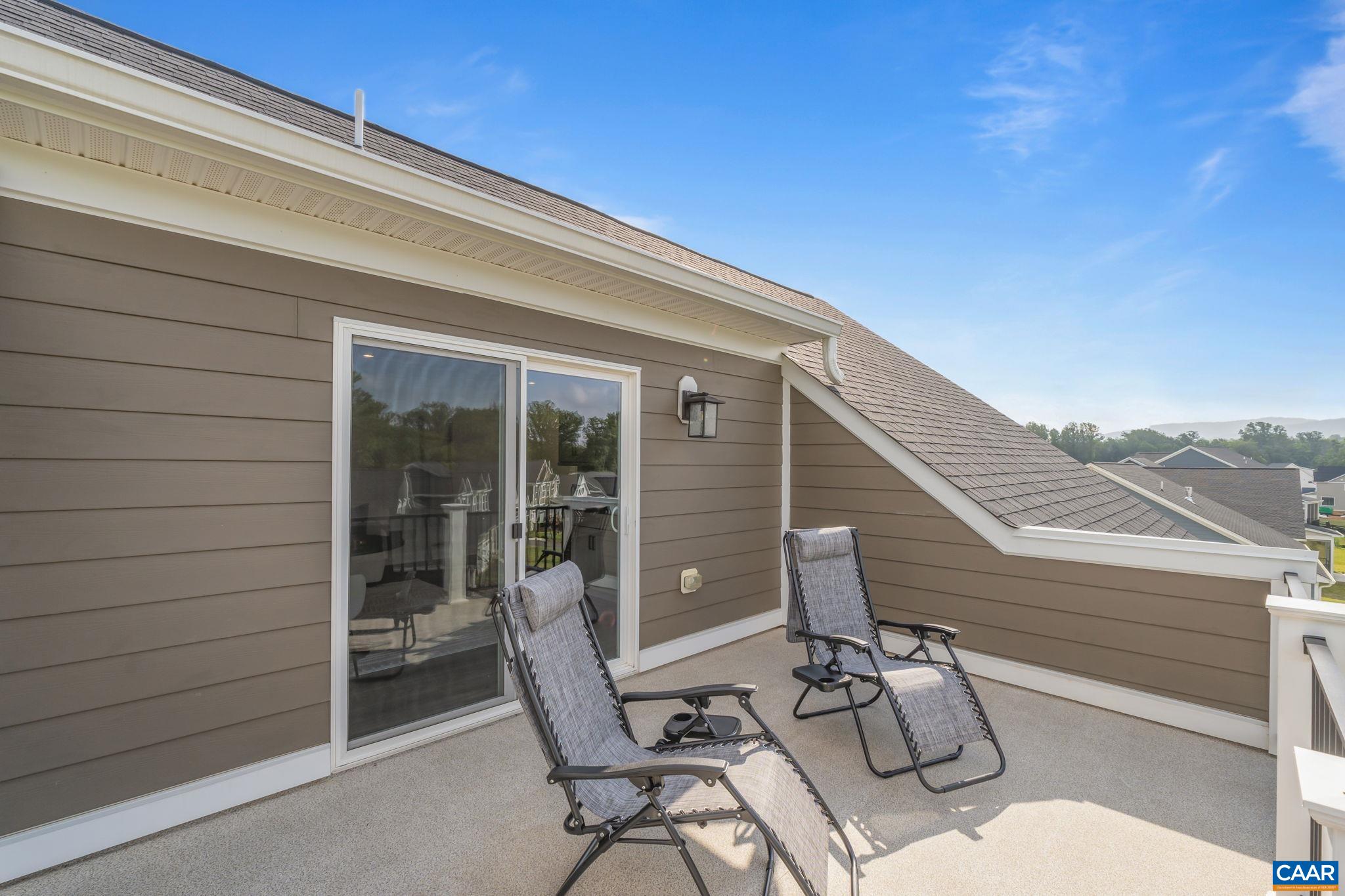1805 Fowler Street Charlottesville, VA 22901 - Photo 53 of 60 a view of a patio with chair and table in the patio
