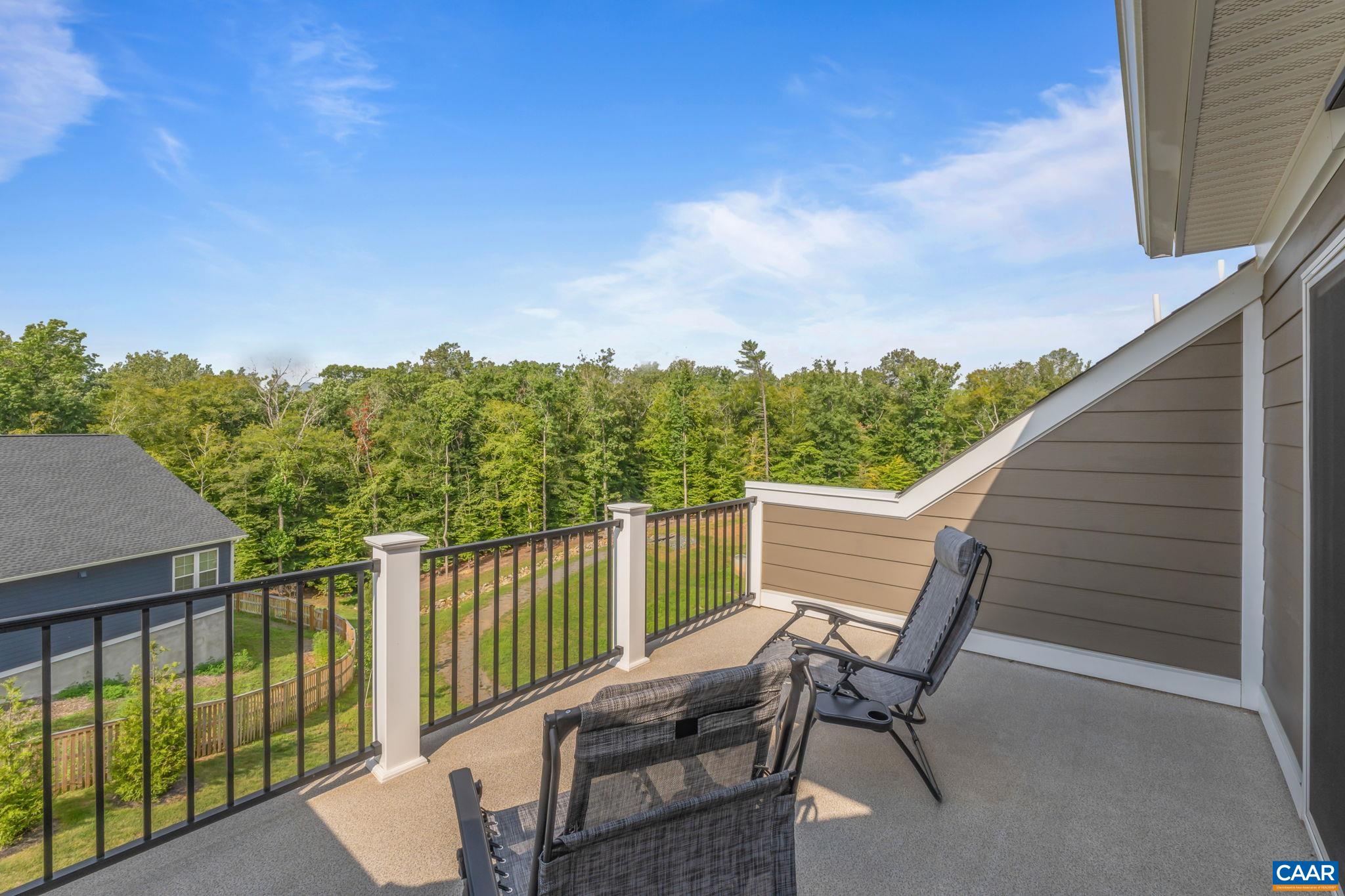 1805 Fowler Street Charlottesville, VA 22901 - Photo 54 of 60 a view of a chair and table in the balcony