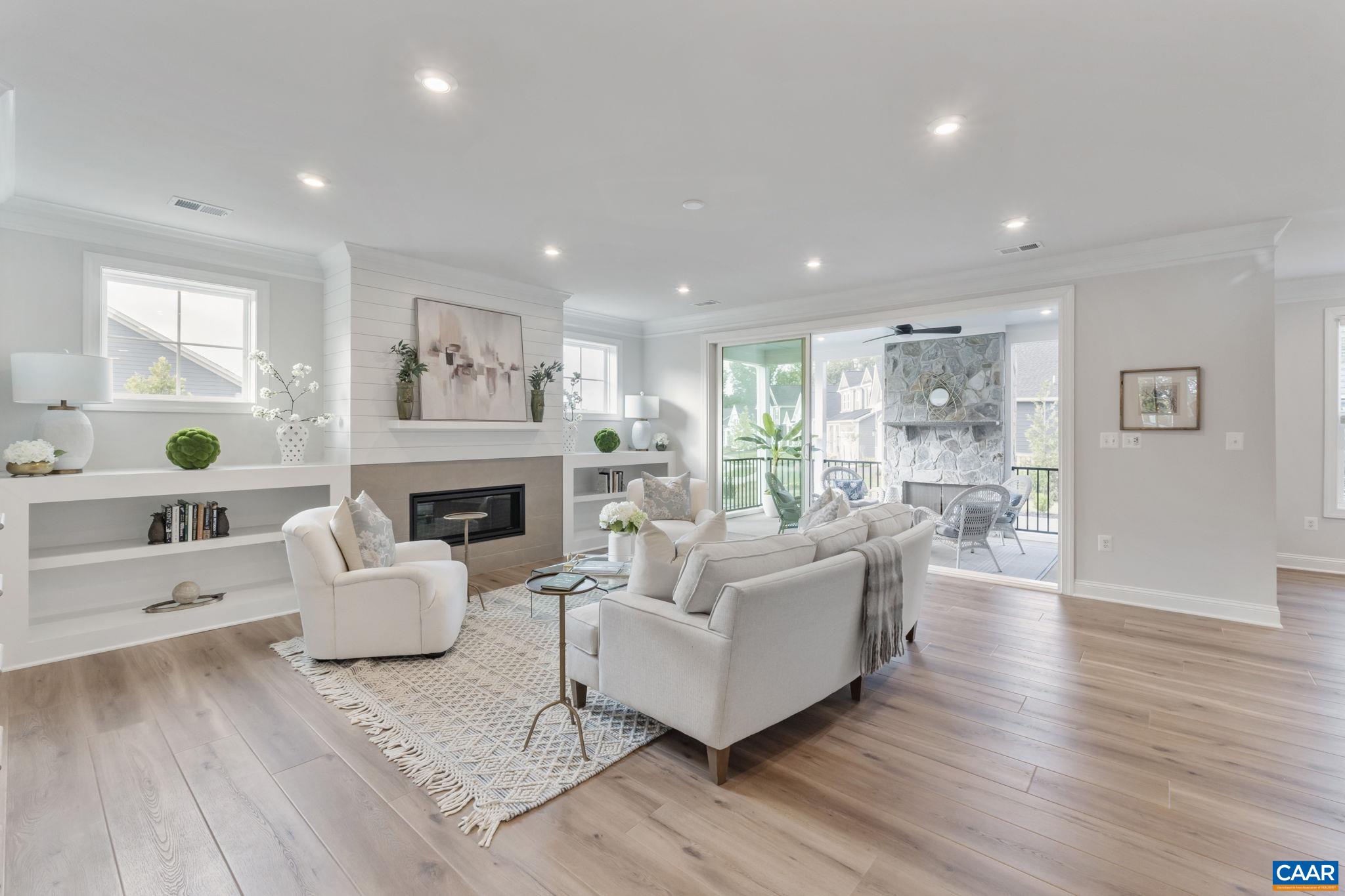 1805 Fowler Street Charlottesville, VA 22901 - Photo 9 of 60 a living room with furniture and a fireplace