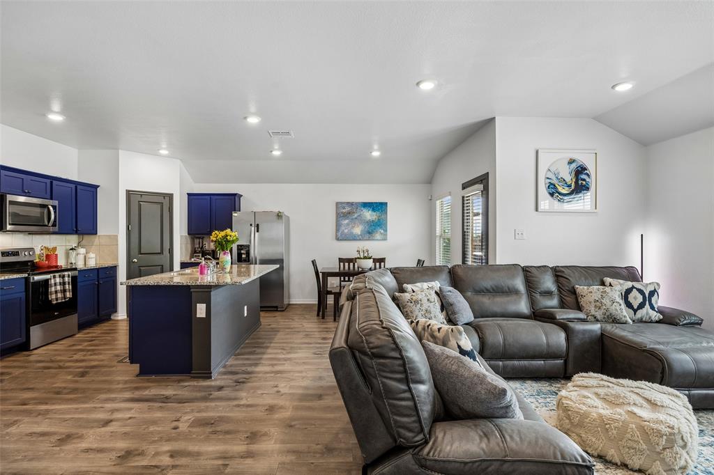 802 Rustic Way Royse City, TX 75189 - Photo 23 of 38 a living room with furniture and kitchen