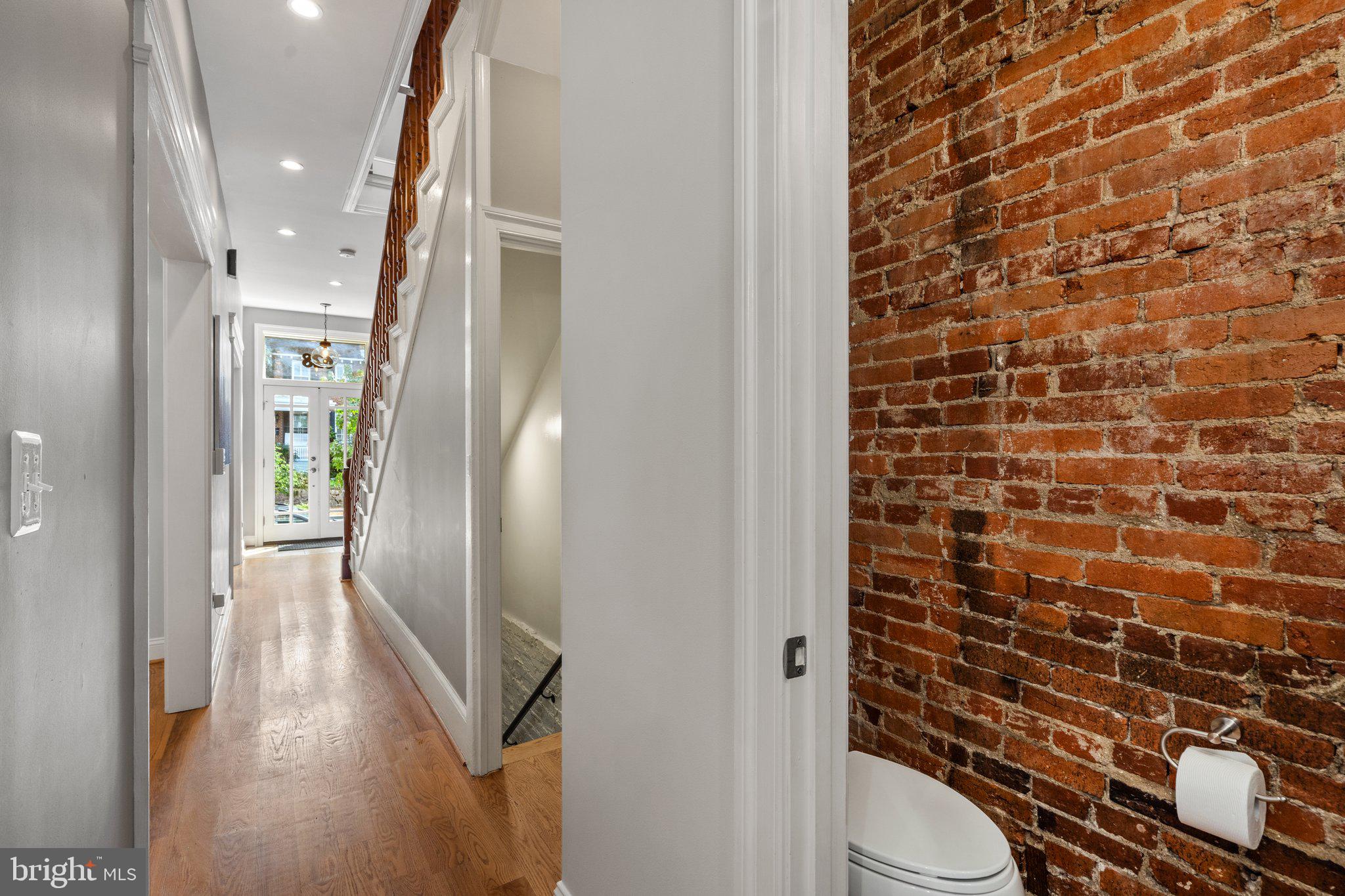 628 E Street Northeast Washington, DC 20002 - Photo 32 of 46 Main level hall - powder rm, stairs to LL