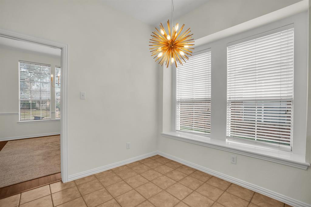 1610 Mapleleaf Falls Drive Allen, TX 75002 - Photo 12 of 36 a view of a room that has a window in it