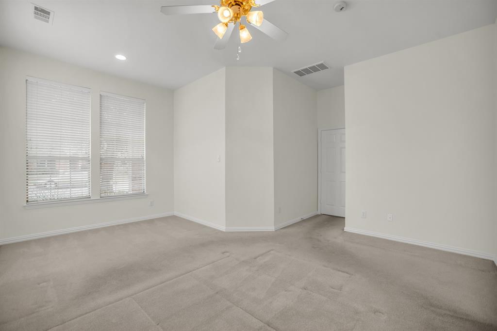 1610 Mapleleaf Falls Drive Allen, TX 75002 - Photo 19 of 36 a view of an empty room with a window
