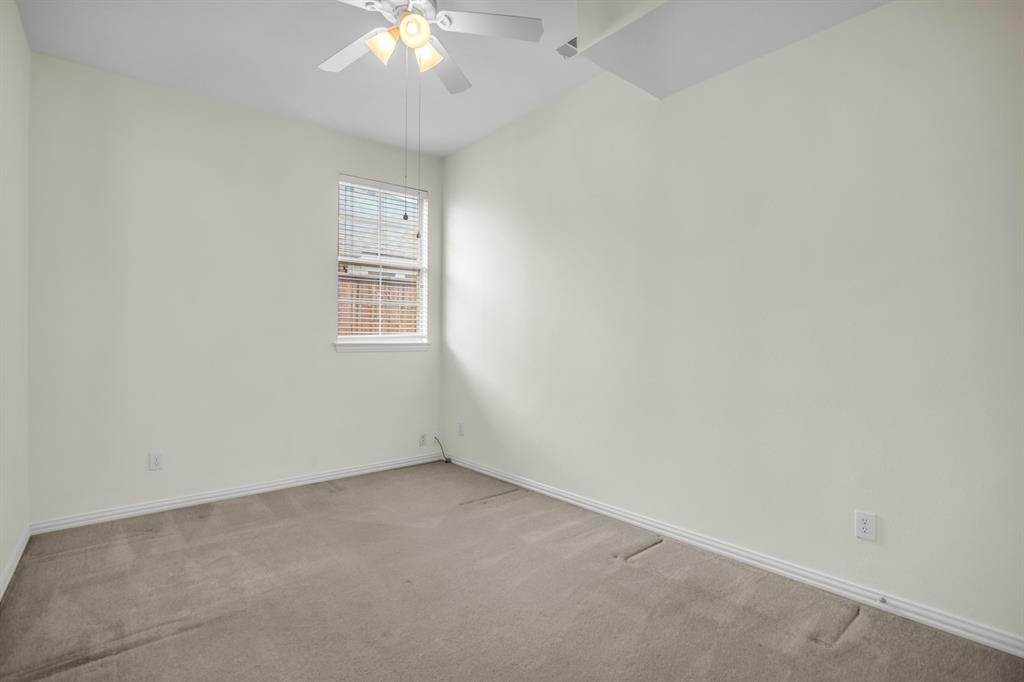 1610 Mapleleaf Falls Drive Allen, TX 75002 - Photo 27 of 36 an empty room with a window