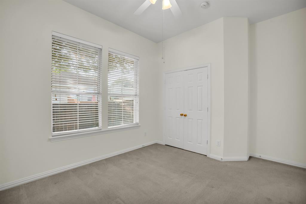 1610 Mapleleaf Falls Drive Allen, TX 75002 - Photo 29 of 36 a view of an empty room with a window