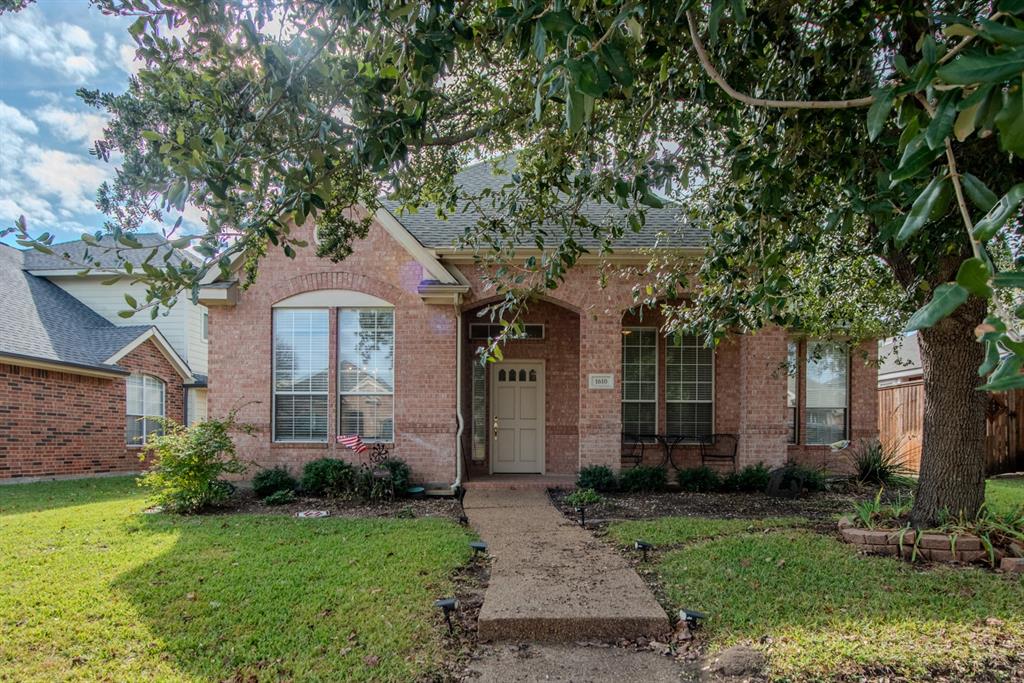1610 Mapleleaf Falls Drive Allen, TX 75002 - Photo 3 of 36 a front view of a house with garden