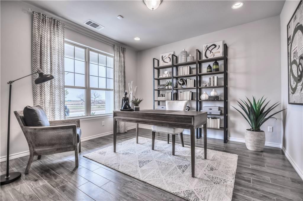 8605 Daisy Cutter Crossing Georgetown, TX 78626 - Photo 7 of 17 a reading room with furniture and a potted plant