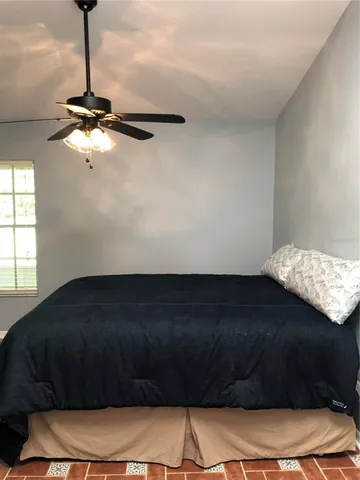 a view of balcony with furniture