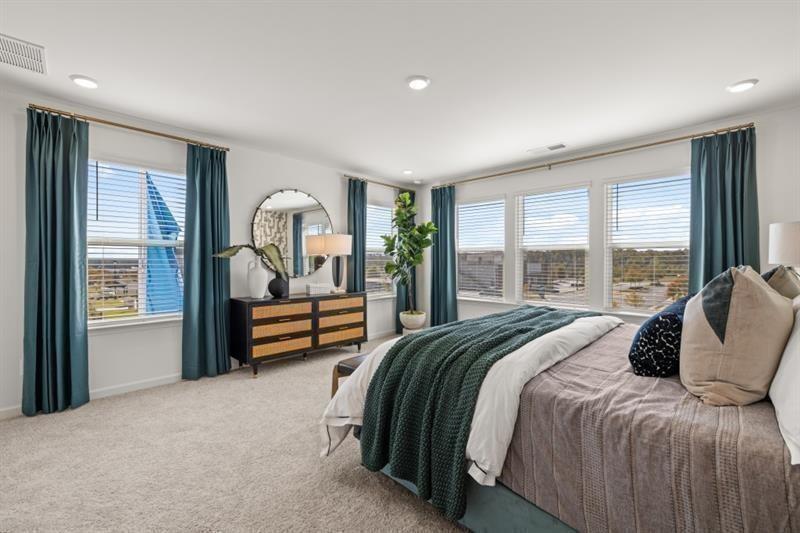 2752 Lou Lou Lane Buford, GA 30519 - Photo 15 of 25 a bed room with a bed and a large window