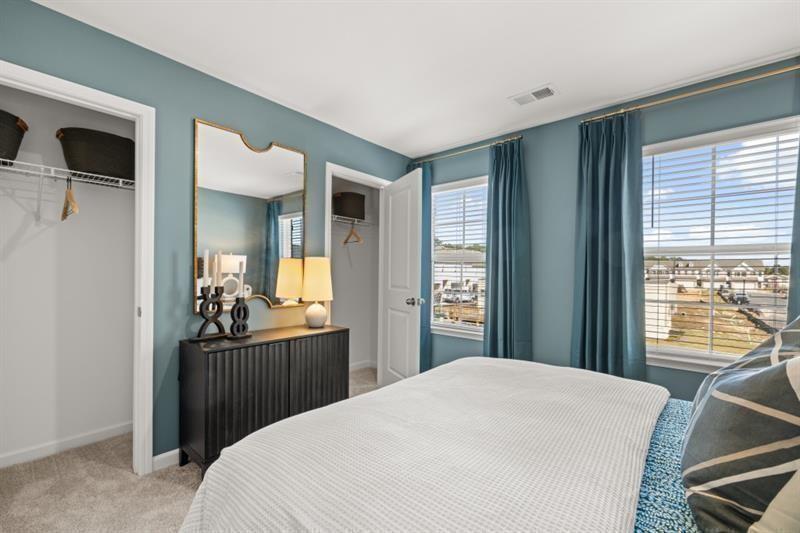 2752 Lou Lou Lane Buford, GA 30519 - Photo 20 of 25 a bedroom with a bed and a large window